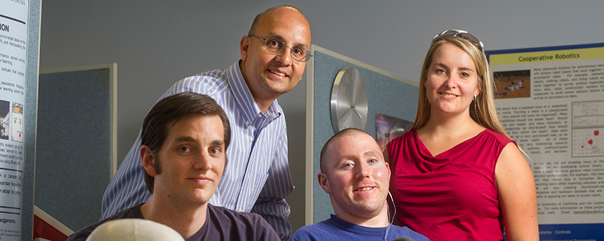 Mechanical and aeronautical engineering graduate student Kenneth Lyons, left, with professor Sanjay Joshi, lab volunteer Adam Shapiro and Maria Skavhaug