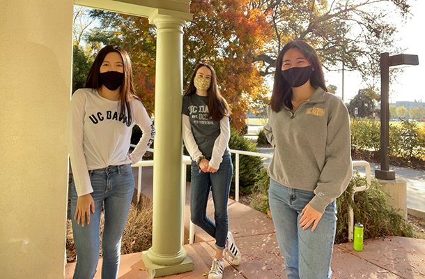 Aggie House co-founders pictured in front of the house