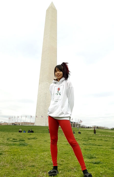 Wei-Hsin "Alice" Hung stands by the Washington Monument