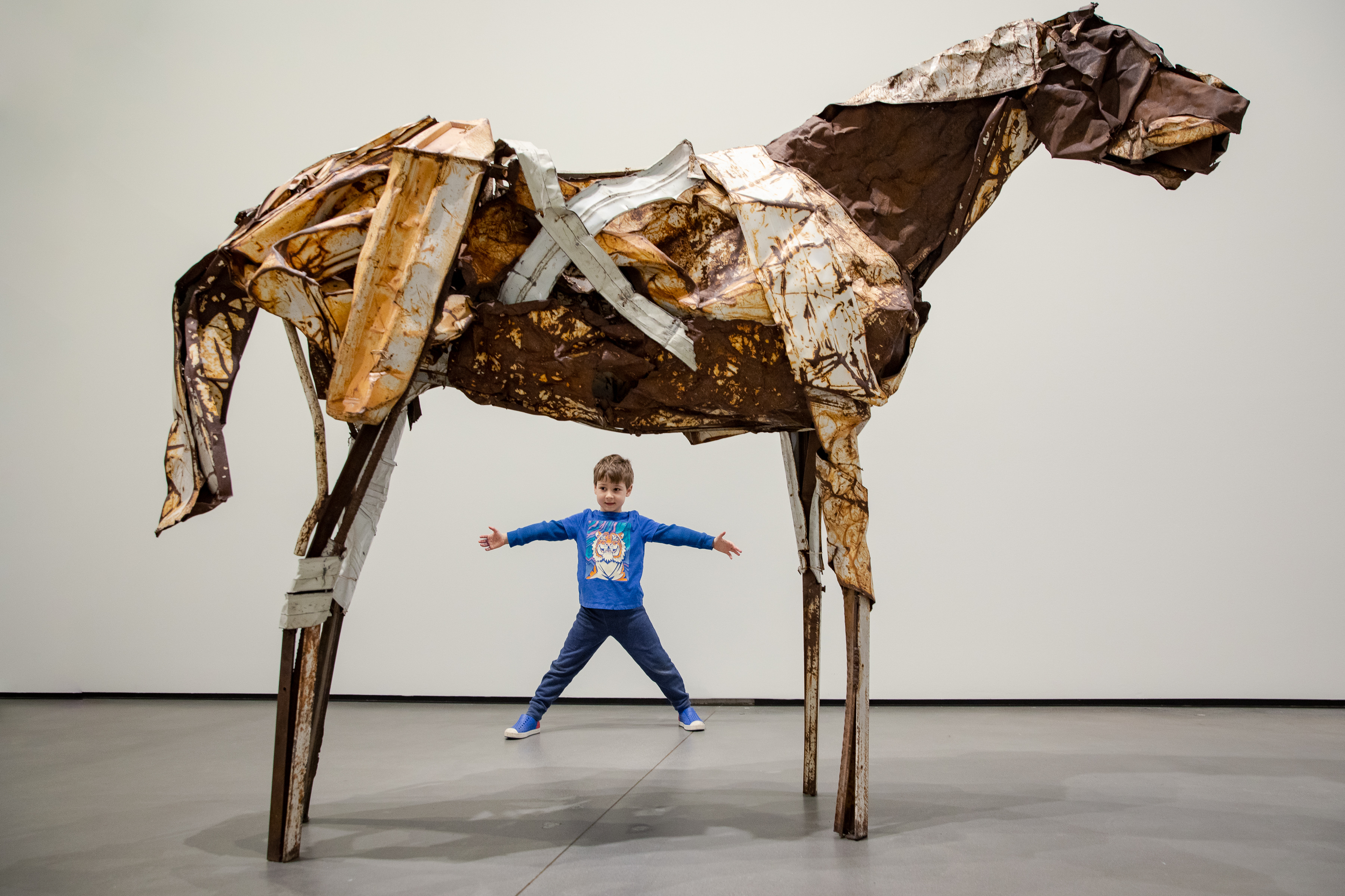 Boy with John, a horse sculpture created by Deborah Butterfield