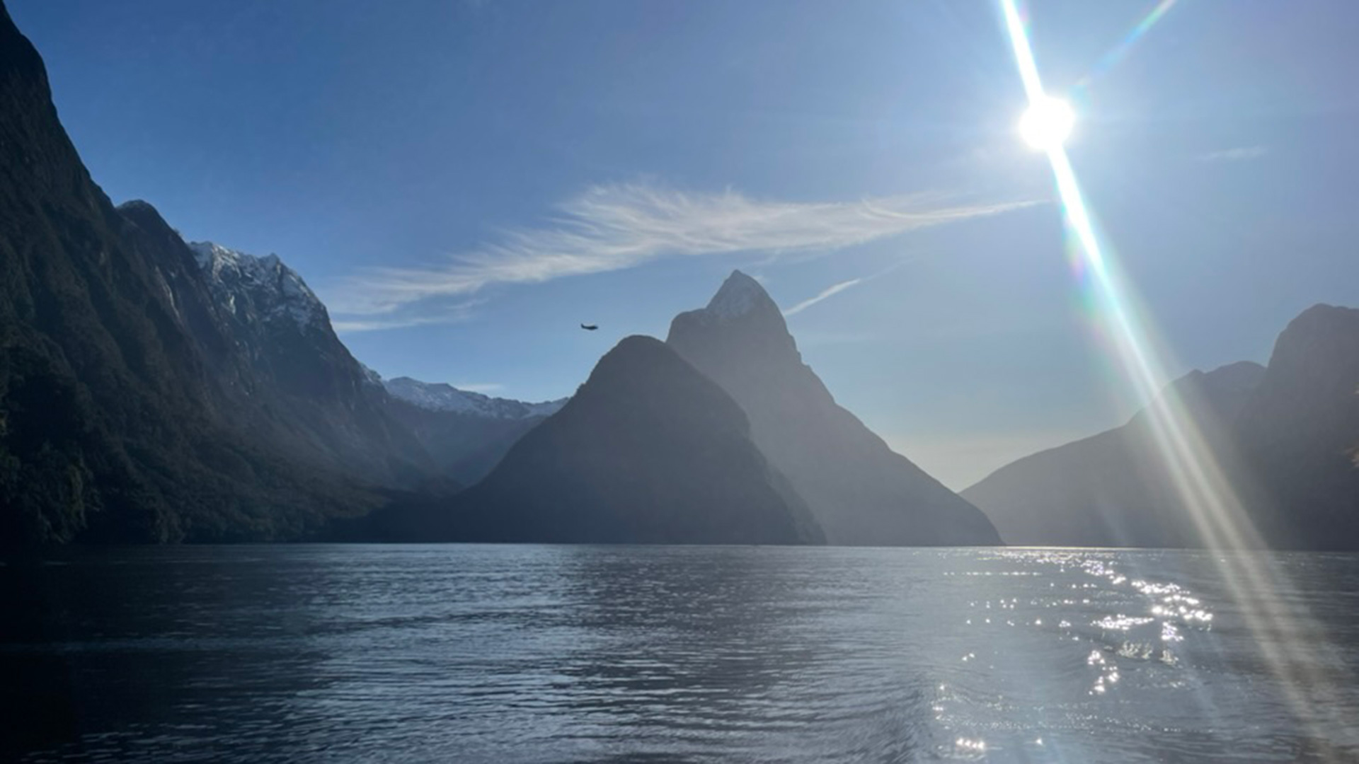 Milford Sound with the sun shining on the water