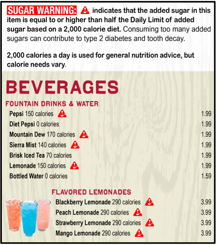 Printed menu panel with a sugar-warning label and list of fountain drinks and lemonades.