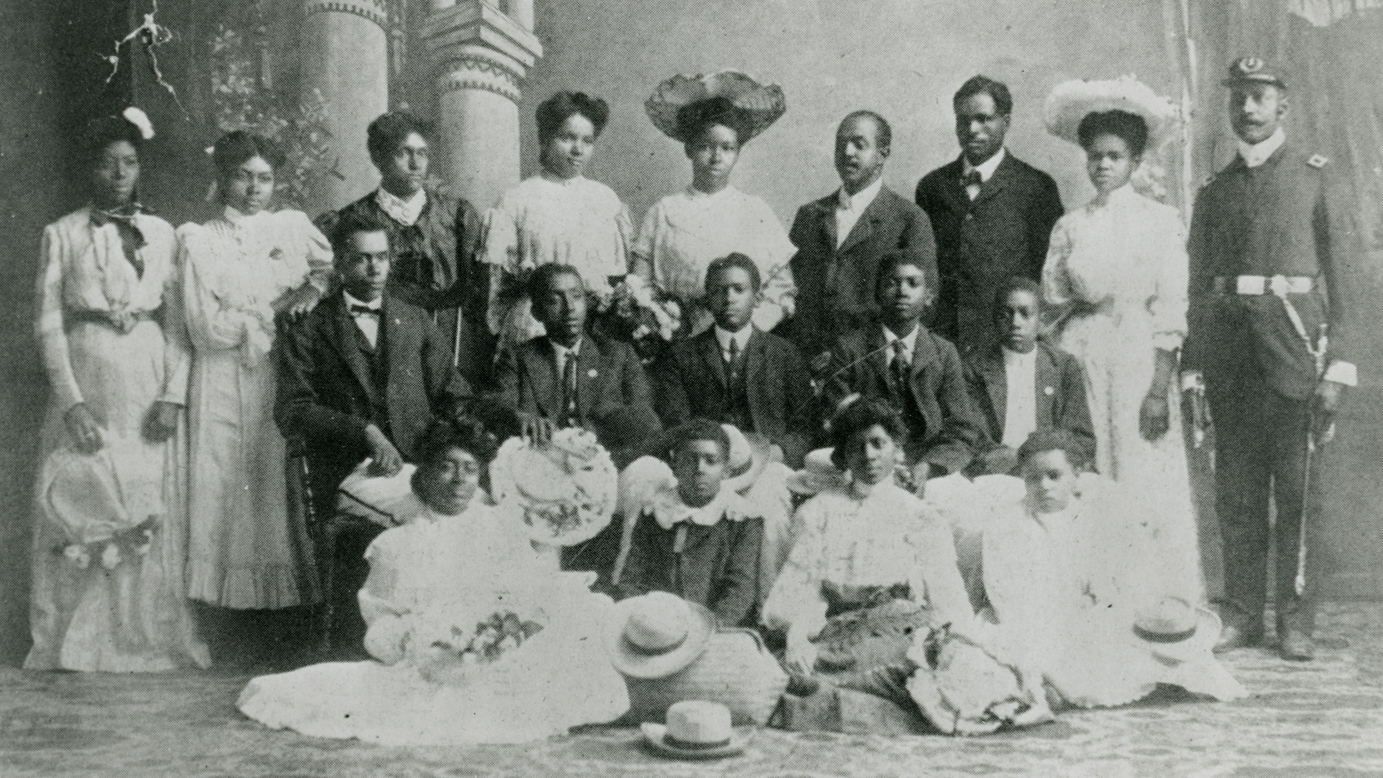 An old photo in black and white shows a group of African American residents who were part of a singing group in Woodland