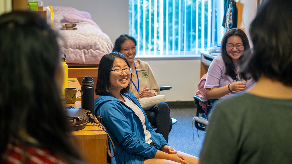 students talk in uc davis dorm