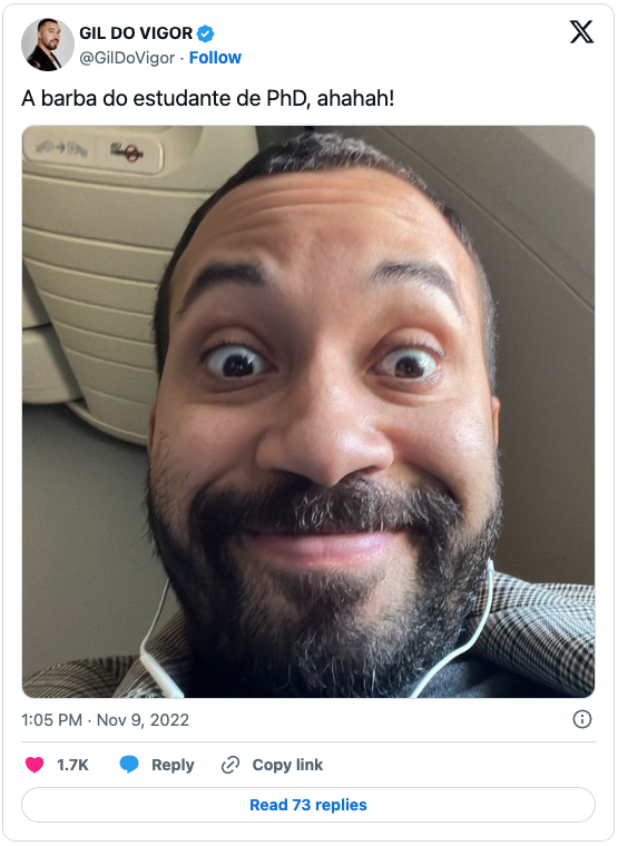 Screenshot of a post on X that shows a selfie of a bearded man with a surprised expression on his face.