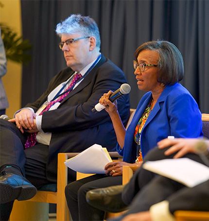 Paul Monks and Helene Dillard on a panel discussion.