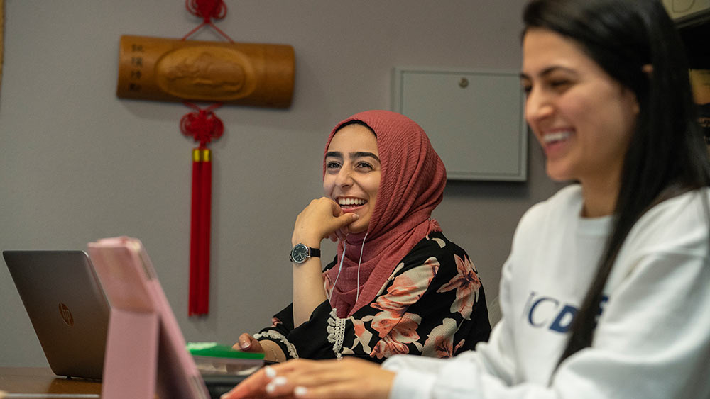 students talk over video chat