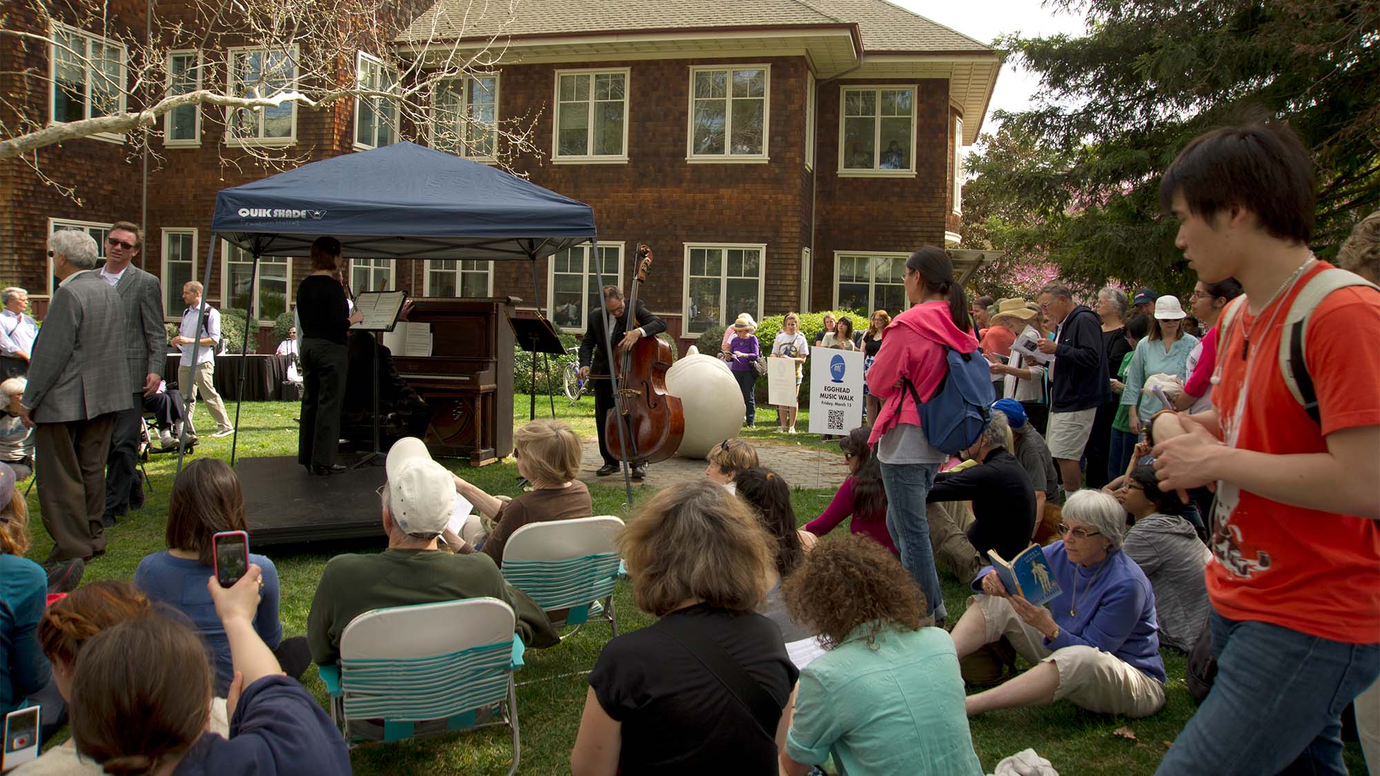 Musicians play near Stargazer Egghead.