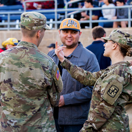 veterans talking in the stadium