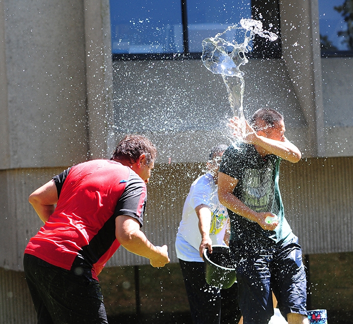 Professors throw water balloons.