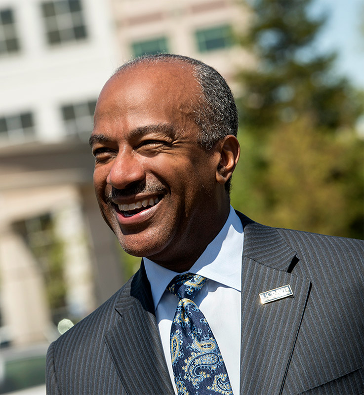 Chancellor Gary S. May smiling.