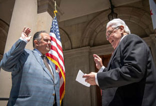 Man being sworn in.