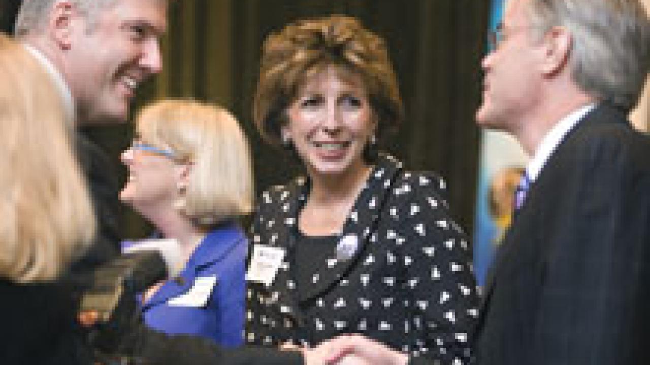 Before giving her keynote speech at the seventh annual Tech Index celebration, Chancellor Linda Katehi talked with Dean Steven Currall of the Graduate School of Management, right, who is shaking hands with GSM alum Vincent Catalano. Marj Dickins