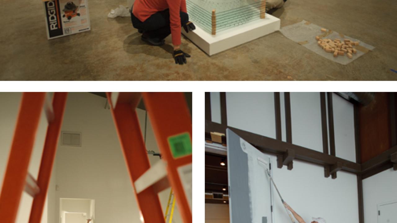 Photos (3): Robin Bernhard and Kyle Monhollen of the Nelson Gallery staff, and Tony Walker and Russ Peters from Tony Walker Painting Co.