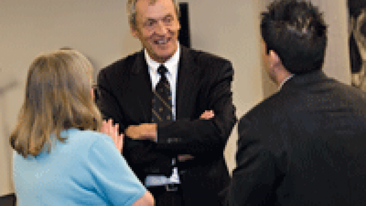 UC President Bob Dynes, center, talks with members of the UC Davis faculty and staff, including Academic Senate chair Linda Bisson, left, and Edwin Arevalo, assistant director of the Academic Senate office.  Dynes has promised UC will turn out 1