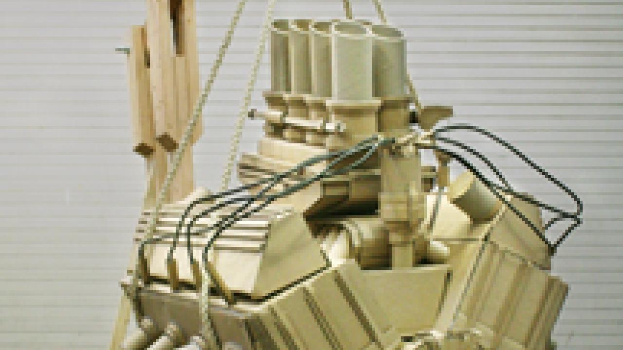 Josh Short's Boss 302 V8: cardboard, hot glue, 2-inch-by-4-inch lumber, rope, zip ties, bolts and found hosing