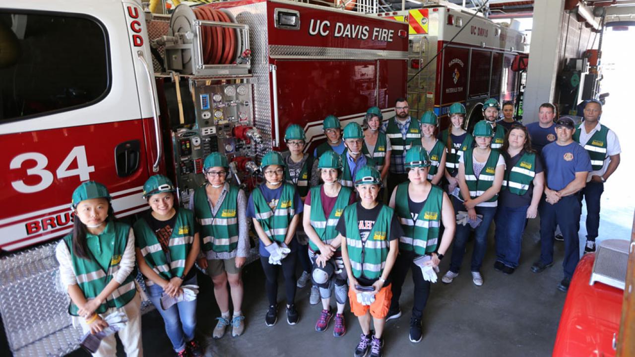 Group photo alongside firetruck