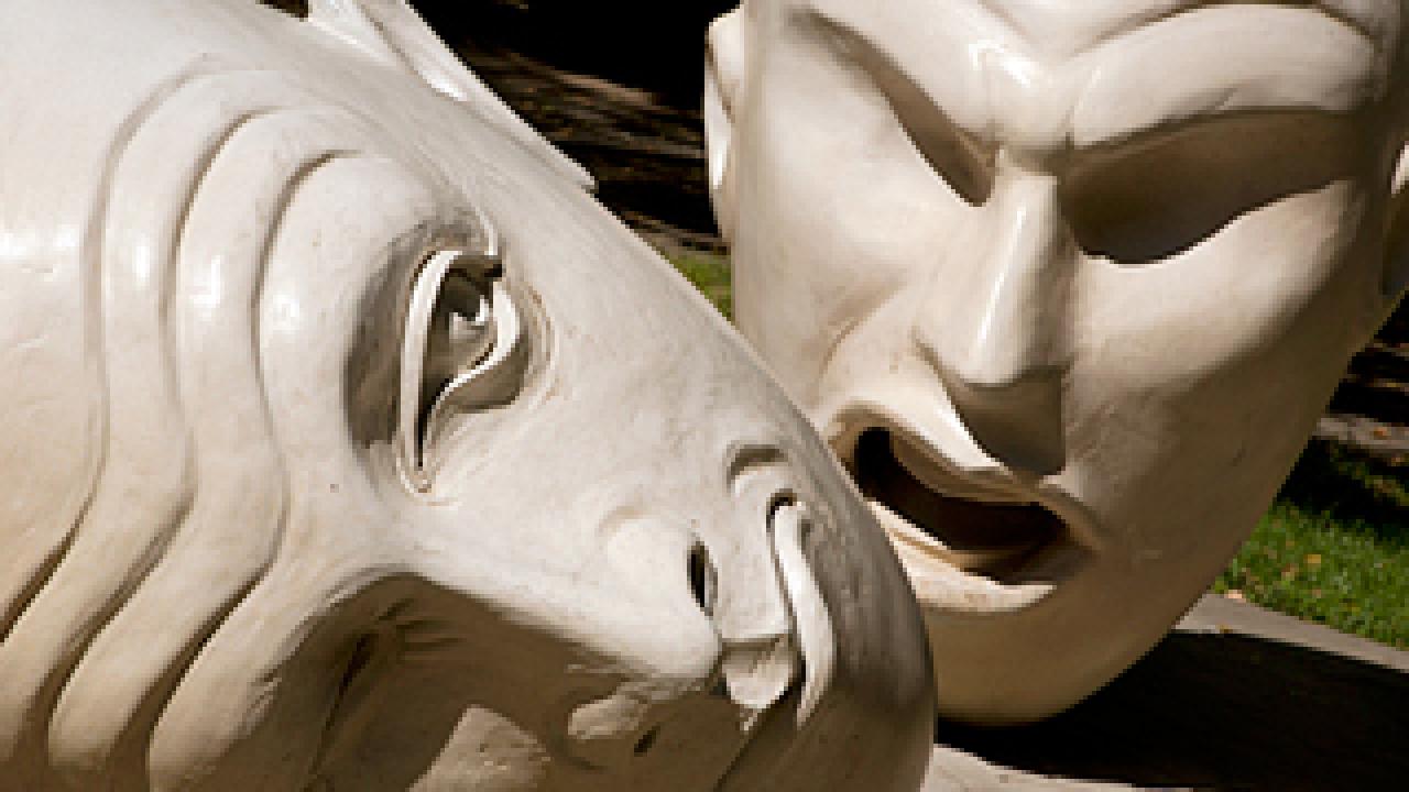 Yin & Yang, Robert Arneson's sculpture duo of two Eggheads, with one talking at the other, which is lying on its ear