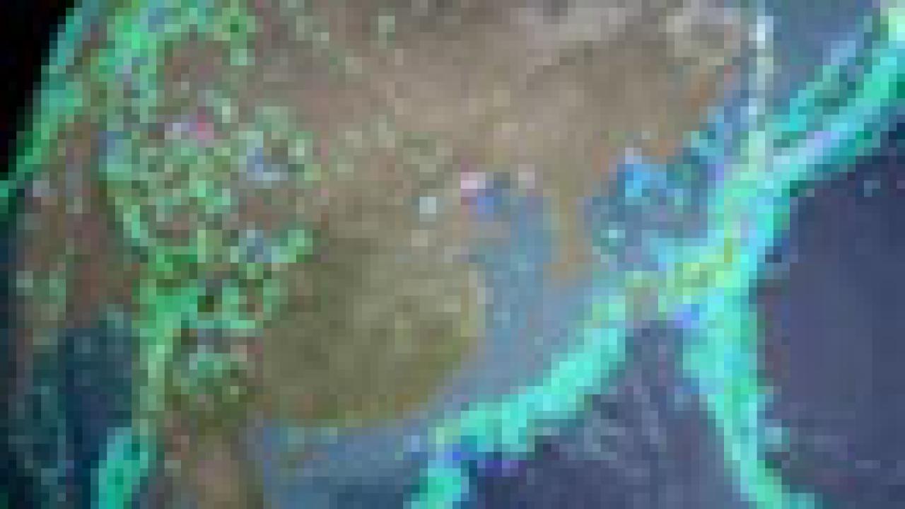 Image: partial of the earth showing Asia and Japan, with blue lights