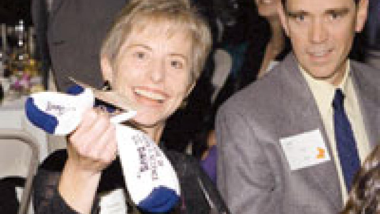 Dean Elizabeth Langland and her husband, Jerry Jahn, who is director of development communications at UC Davis, celebrate the 50th anniversary of the College of Letters and Science in late 2001. The couple has children living near SUNY's Purchas
