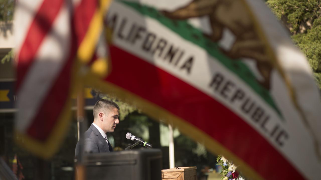 Nick Chase speaks at a Memorial Day ceremony at UC Davis.