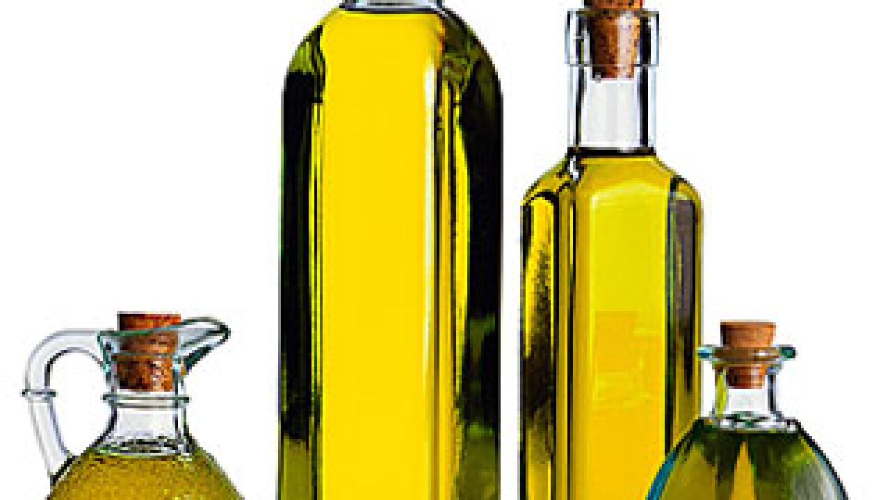 Photo: four containers with olive oil