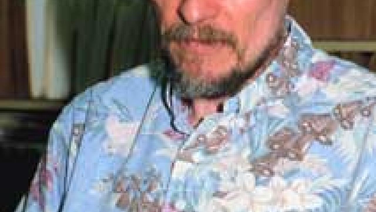 Photo: man holding shell