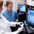 Alex Ardans of the California Animal Health and Food Safety Lab System is working with colleagues including graduate student Beate Crossley here to find more efficient ways to manage the huge amounts of data that rush in when animal disease brea