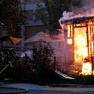 Firefighters battle Cargo Coffee hut fire outside King Hall