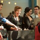 Photo: Chancellor Linda P.B. Katehi at work behind the counter at Swirlz, with crewmates Andrew Stump, Lucy Avalos, Ryan Little and Lauren Woods.