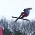 Screenshot of freeskier flying above halfpipe.