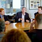 Hillel Damron, left,  executive director of Hillel in Davis and Sacramento, and Donald Cohen-Cutler, a UC Davis junior and international relations major, right, look on as Dennis Ross discusses foreign policy during one of his three campus talks