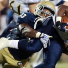 Linebacker Steven Pitts stops a Northern Arizona running back