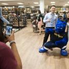 Students pose for a photo with Gunrock in the newly remodeled Campus Store.