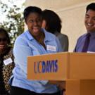 Freshman student Porch&Atilde;&iexcl; Chambers reacts as she shakes Chancellor Larry Vanderhoef&rsquo;s hand during a Sept. 21 ceremony in Sacramento honoring Chambers and four other students participating in the Reservation for College program.