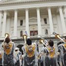 From the top, Robert Kerr of UC Davis, right, meets with State Sen. Mike Machado, D-Linden; the Aggie Band-Uh! serenades the State Capitol; and Assembly Speaker Fabian N&Atilde;&ordm;&Atilde;&plusmn;ez, D-Los Angeles, receives Legislator of the Year recognition.