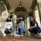 Aggie House co-founders pictured in front of the house