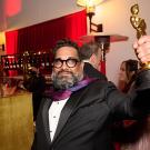 Joseph Patel holds his Oscar