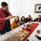 Family having cake at dinner table