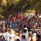 A view of the Picnic Day Parade with the crowd watching from the sidelines.