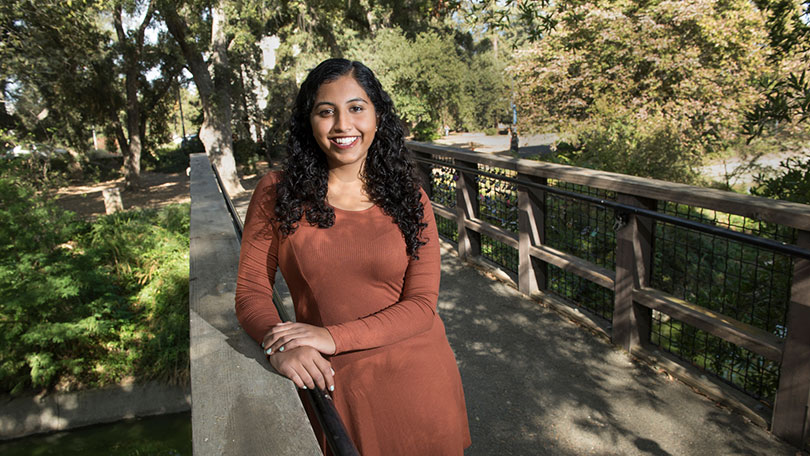 Gopika Mavalankar on a bridge in the UC Davis Arboretum